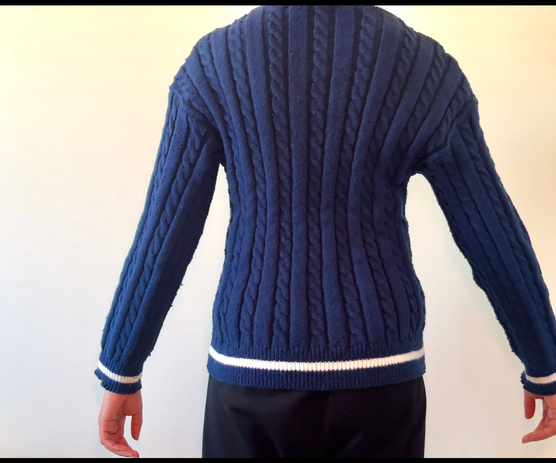 Navy blue cable-knit sweater