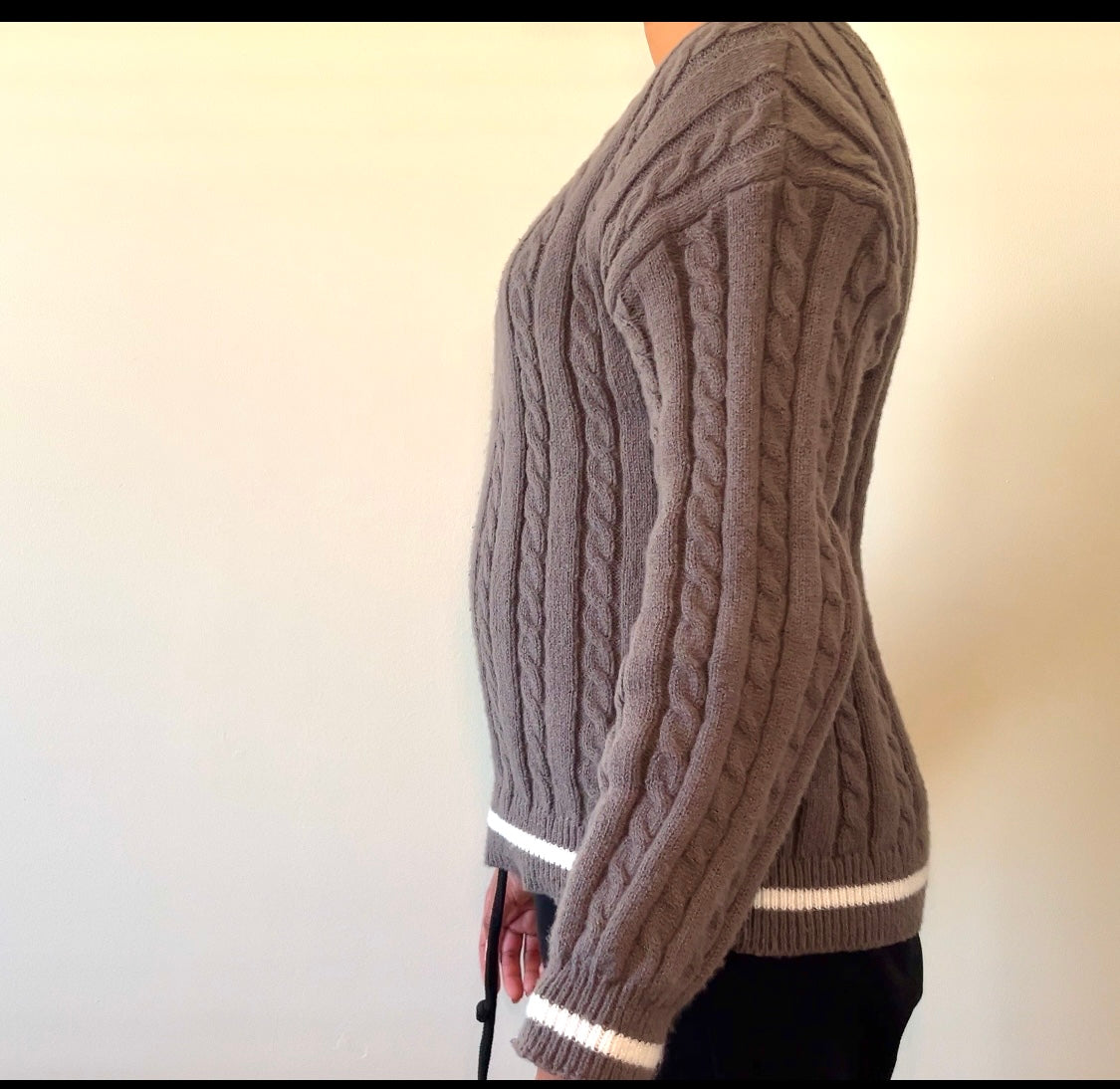 Gray cable-knit sweater