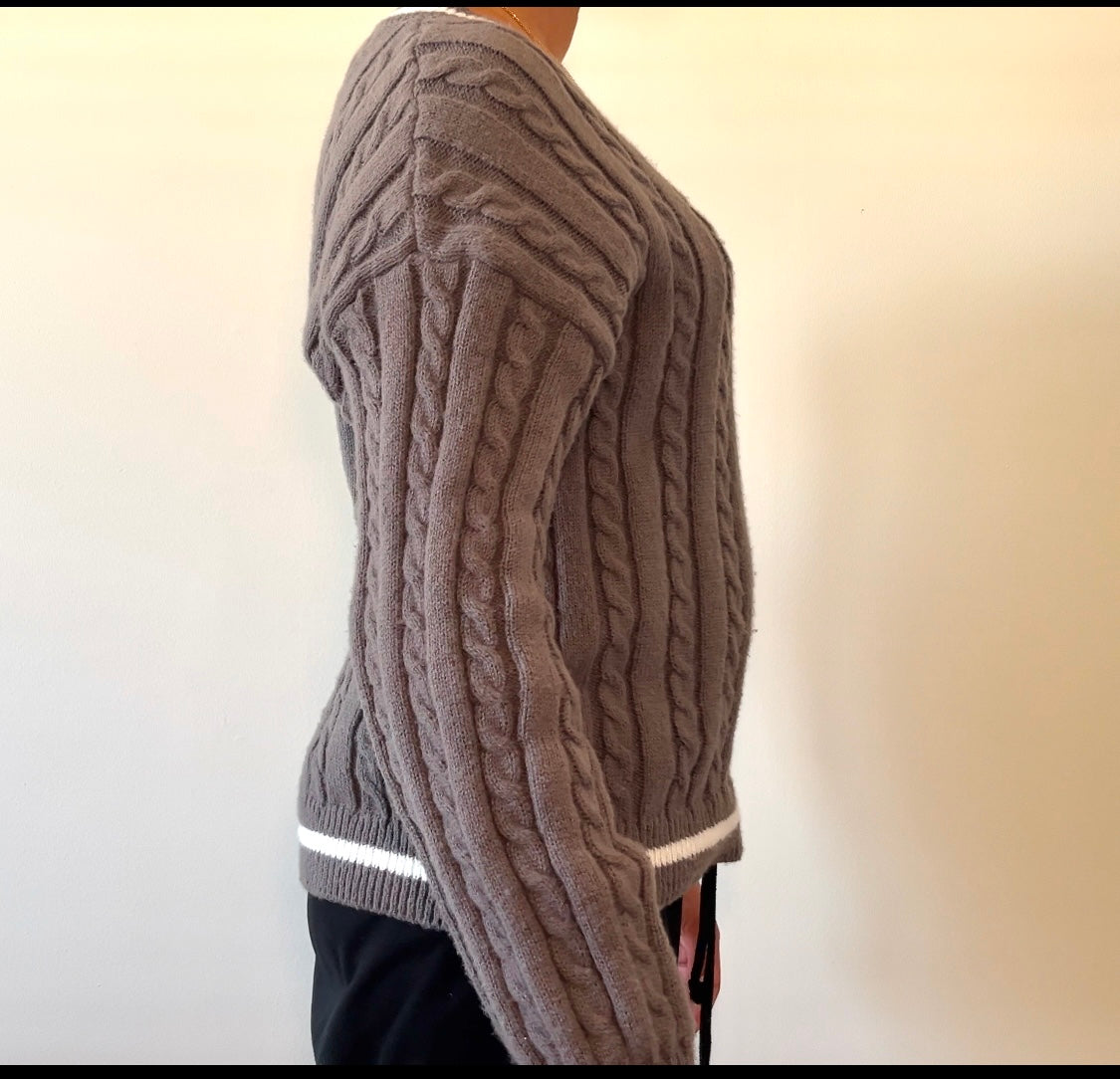 Gray cable-knit sweater