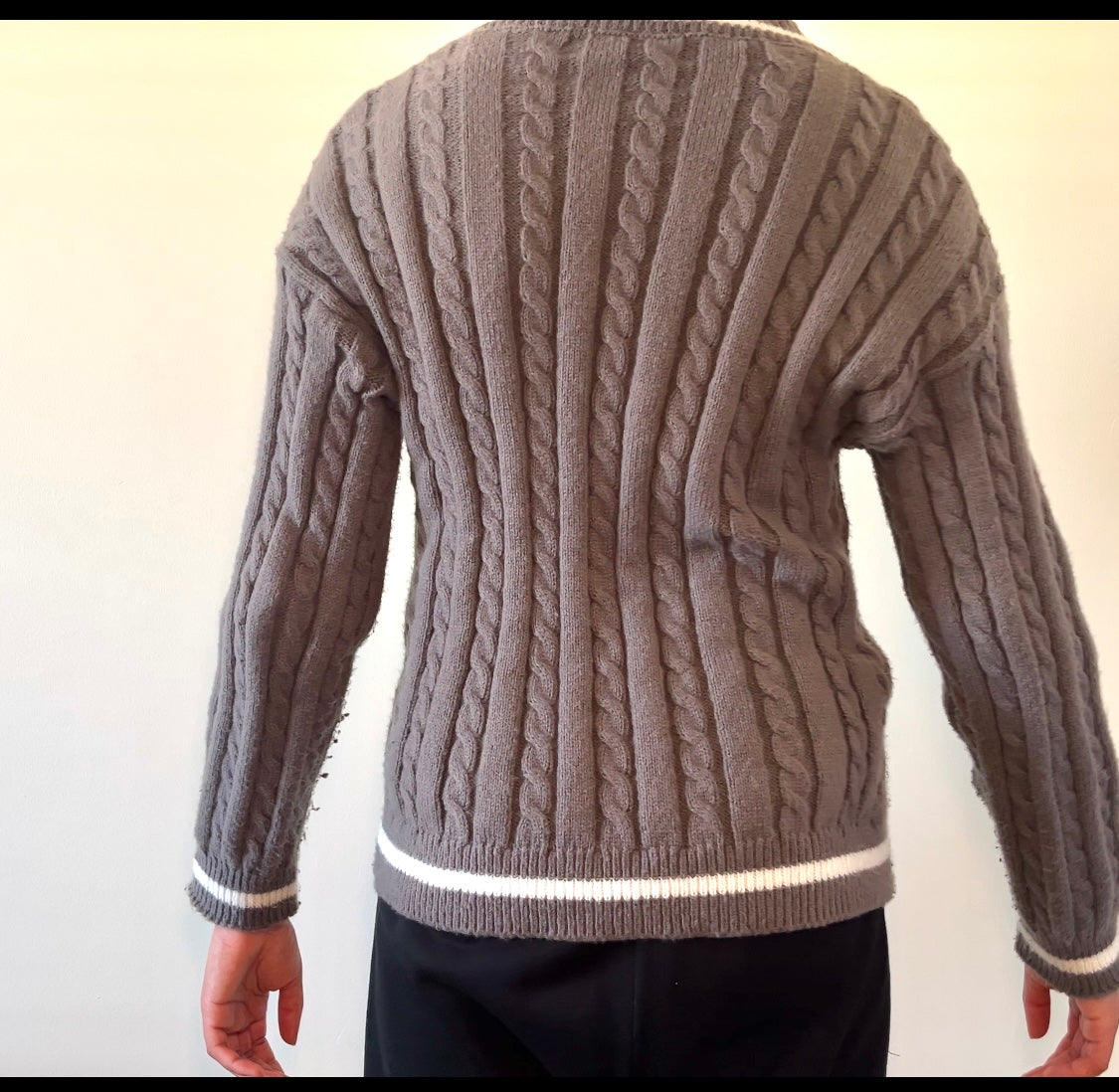 Gray cable-knit sweater