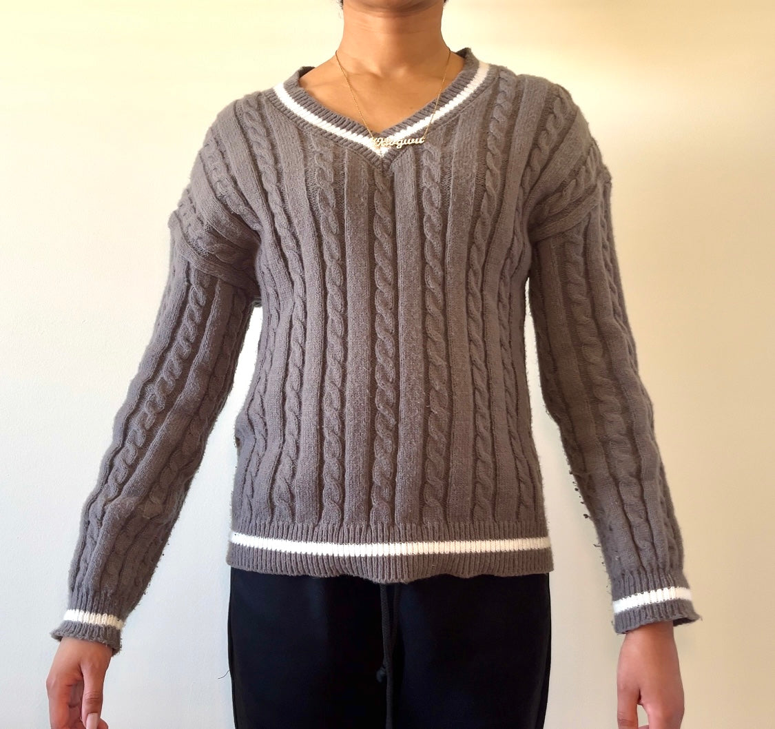 Gray cable-knit sweater